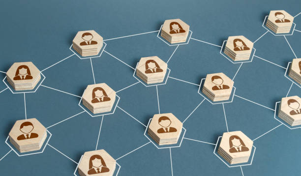 istock People are connected in a communication network. Corporate connection. Exchange of information and cooperation in the work process. Relationships and subordination. Combining efforts on the project. 1399807155
