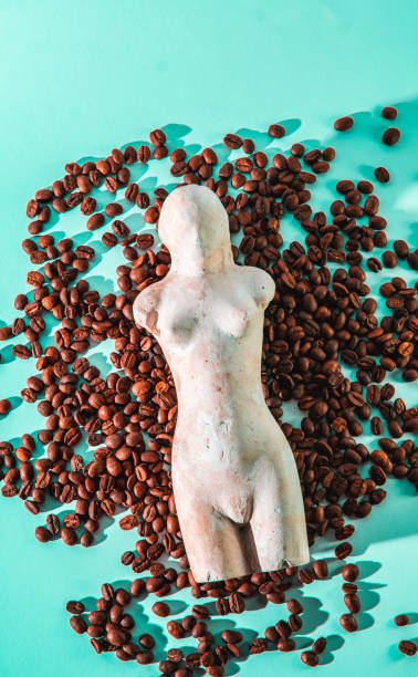 Loving coffee. Sculpture on coffee beans