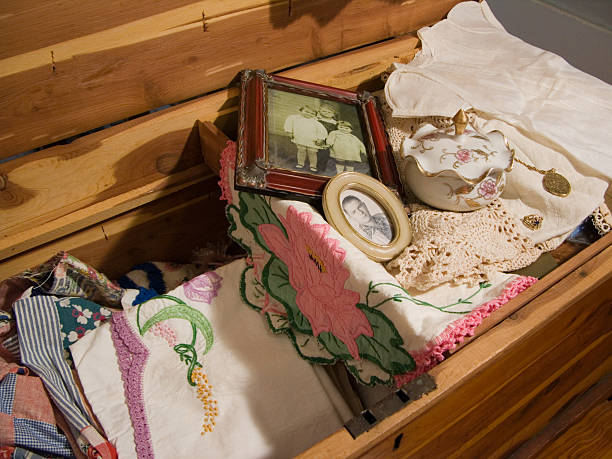 Grandma's Treasures antique cedar chest with vintage linens, photographs and knicknacks locket photos stock pictures, royalty-free photos & images