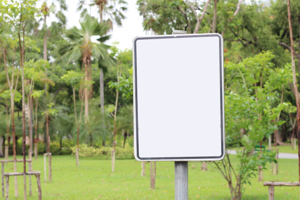 Blank sign on garden background.