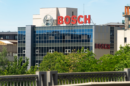 Bucharest, Romania - May 20, 2022: The logo of German multinational engineering and technology company Bosch is seen on the top of a building.