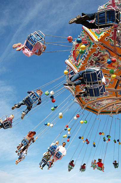 istock A swing ride at a theme park with many chairs 139981589