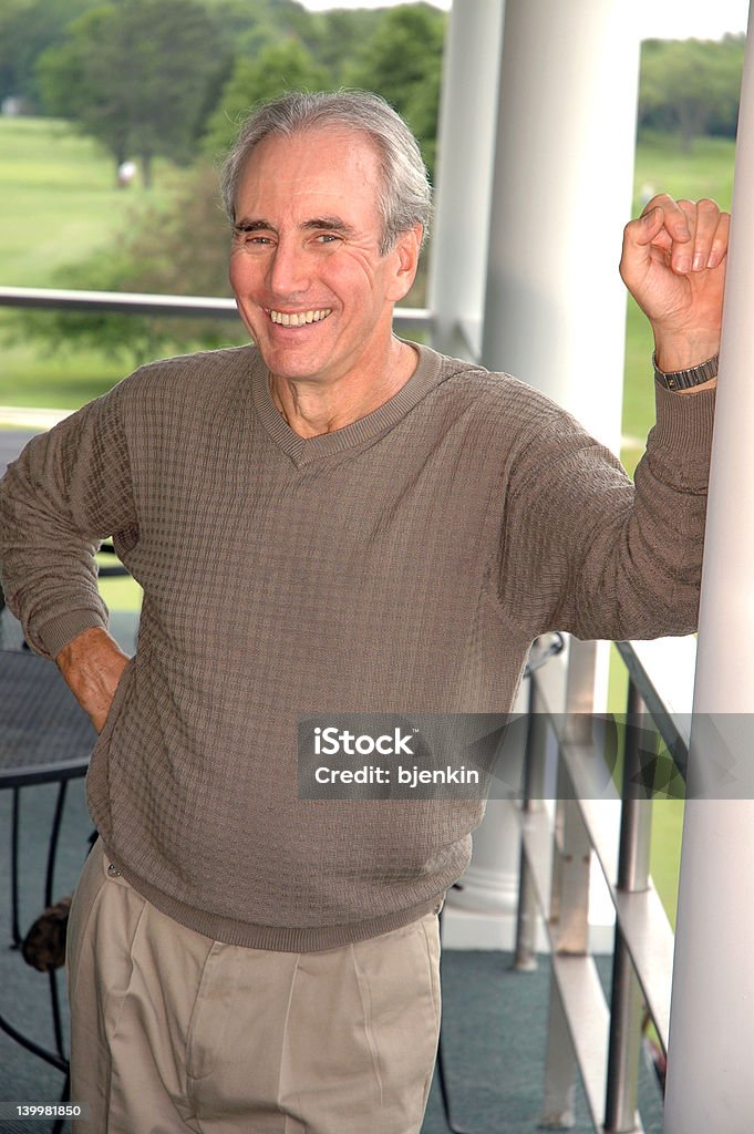 Club Middle aged guiy at golf club. Adult Stock Photo