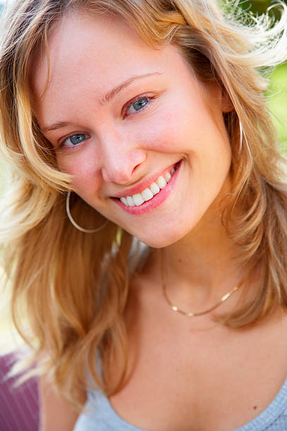 istock Fashionable young woman smiling 139982440
