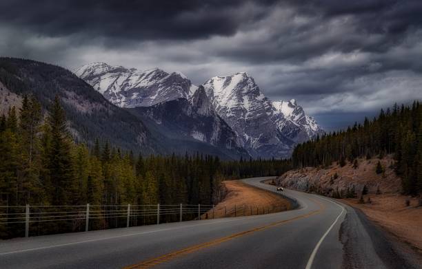 istock Moody Cloudscape Over Kananaskis Mountain Roads 1399830919