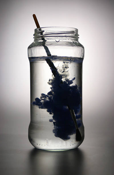 istock paint brush in water jar 139983138
