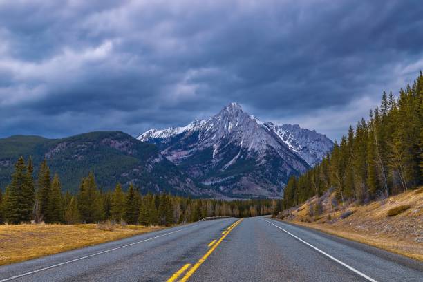istock Gloomy Clouds Over Mountain Roads 1399831463