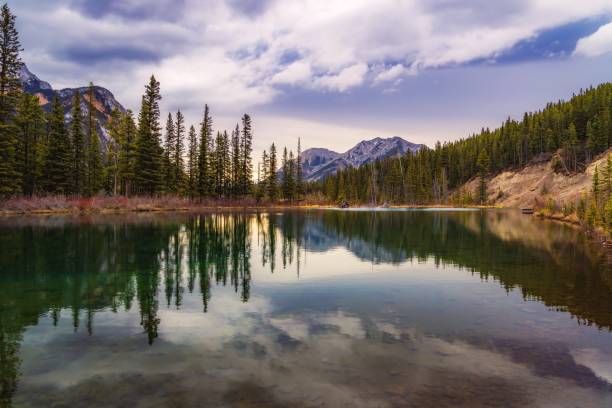 istock Cloudy Morning Reflections On Mount Lorette Ponds 1399831515