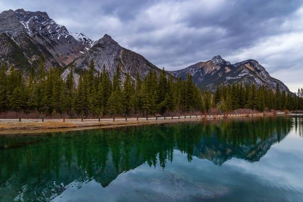 istock Mountain Reflections On A Park Lake 1399831543