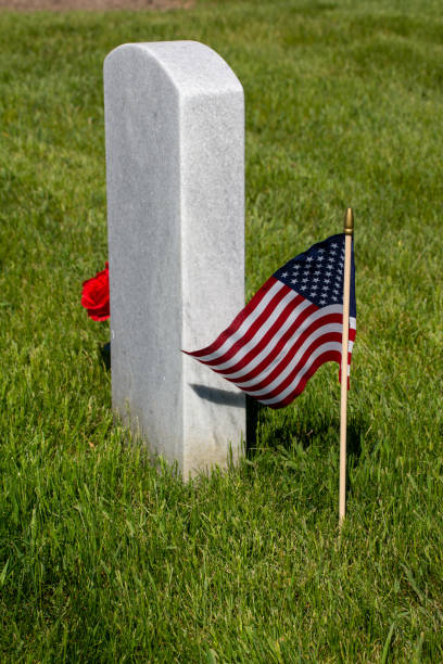 istock Military gravestone with American flag 1399831822