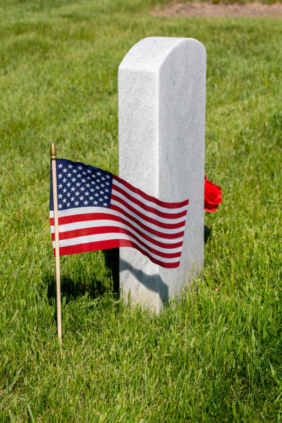 istock Military gravestone with American flag 1399831875