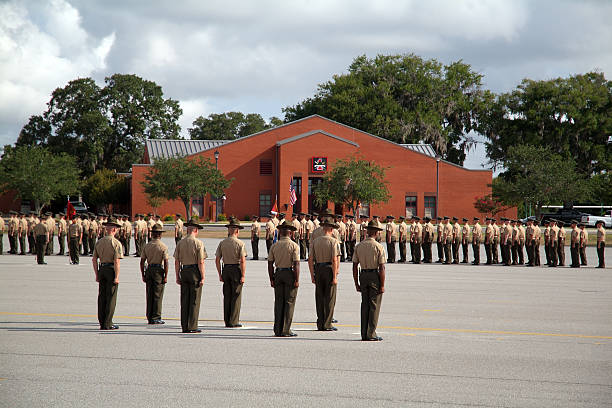 Graduation of Marines from Parris Island 01 A dramatic shot of the graduation ceremony at US Marine Corps recruit depot, Parris Island, SC barracks photos stock pictures, royalty-free photos & images