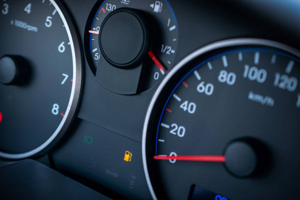 istock Fuel car gauge empty. Petrol tank meter car indicator on dashboard. Low gasoline level. Empty fuel gas gauge. 1399837428