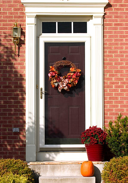 istock door with autumn wreath 139984188