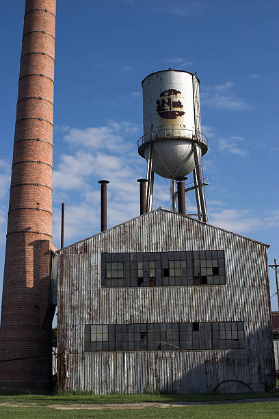istock Abandoned factory building with water tower and chimney 139984501