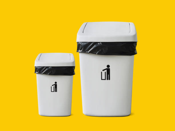 istock Plastic waste basket with lid isolated on yellow background with aisle 1399848733