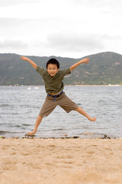 jumping boy stock photo