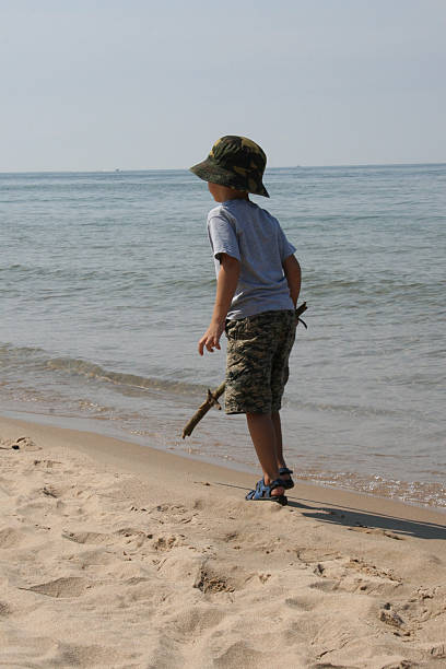 Boy On Beach 2 stock photo