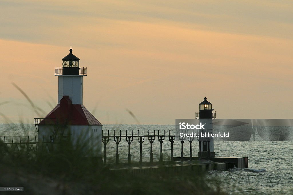 Farol ao pôr do sol, St. Joseph MI - Foto de stock de Céu - Fenômeno natural royalty-free