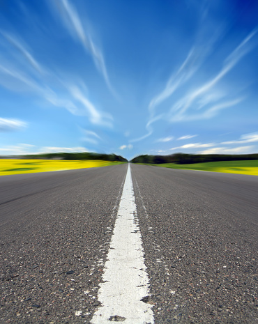 Manipulated Image Of A Highway Under A Wavy Blue Sky Stock Photo ...