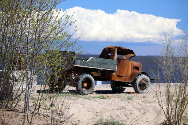istock old rusty military truck on the seashore, 1399854607