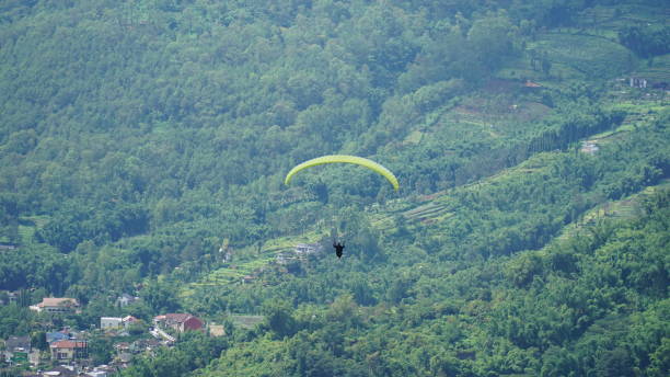istock Paragliding in Batu, Indonesia 1399858482