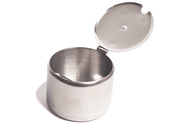 istock Metal jar container isolated on white background. Container for spices,tea, with spoon 1399858544