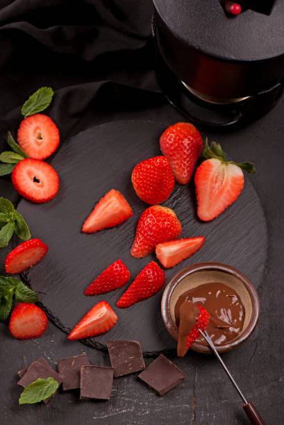 istock Flat lay composition with chocolate covered strawberries on grey background 1399860855