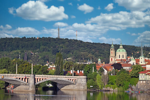 istock Old buildings and churches in Prague Vltava river 1399860866