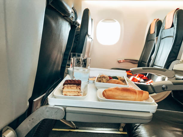 istock eating in the airplane 1399861041