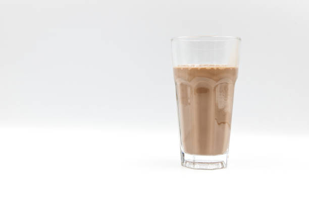 istock Chocolate milk in a glass on a white background. 1399861131