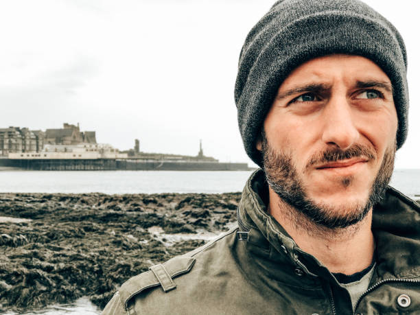 istock solitude man on the pier in winter 1399861209