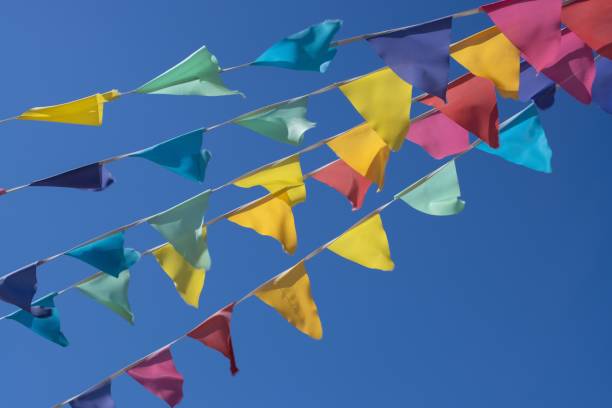 istock beautiful festive colored flags in the wind, decor 1399862153