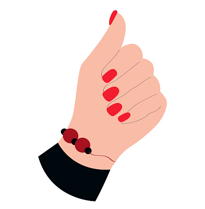 Woman's hand with red polished nails showing manicure with bracelet