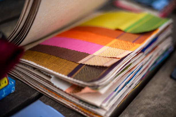 istock Cloth fabric book - Cotton thread and seeds textiles garments 1399866120