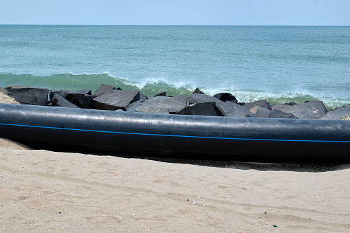 Sea water intake pipe at the beach