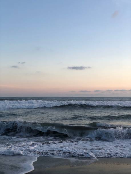 istock Photo of waves on the beach 1399870214