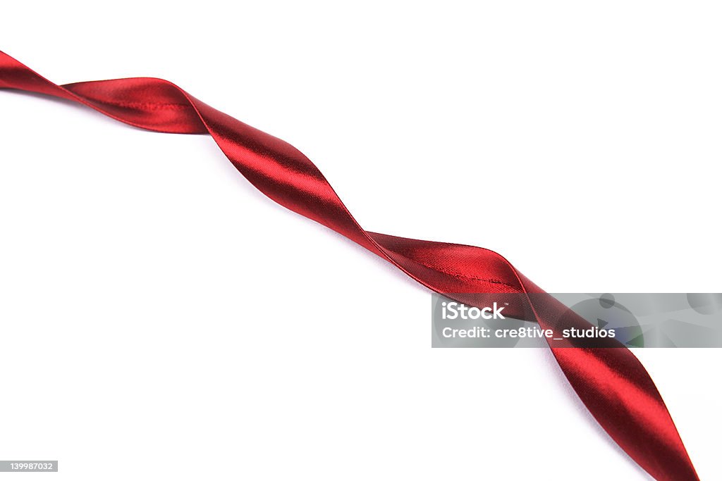 Red ribbon Twisted red ribbon on a white backgroud Hotel Reception Stock Photo