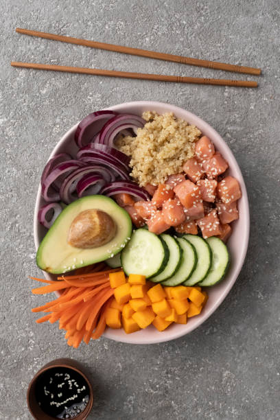 istock Poke bowl Quinoa with salmon and vegetables 1399870681