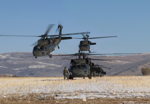 Multiple Blackhawk helicopters 