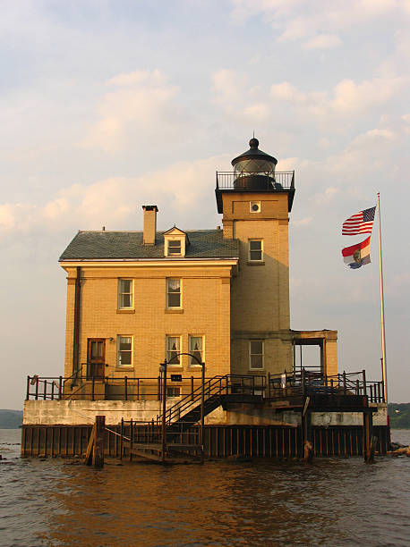 Rondout Creek Lighthouse, Kingston, NY Lighthouse at the mouth of Rondout Creek on the Hudson River, Kingston, NY, as seen from a boat on the water. kingston harbour stock pictures, royalty-free photos & images