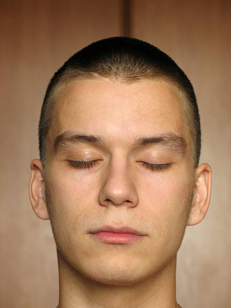 istock Caucasian male closing his eyes 139987663