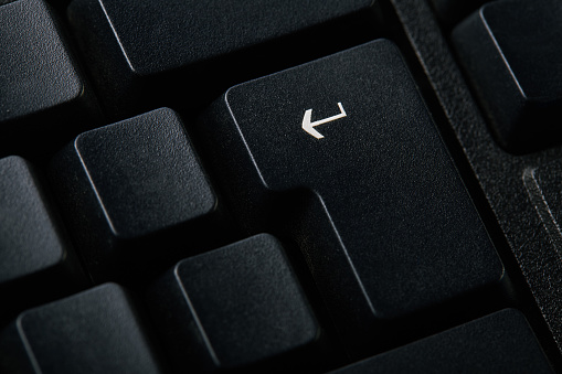 Close-up enter key on the computer keyboard