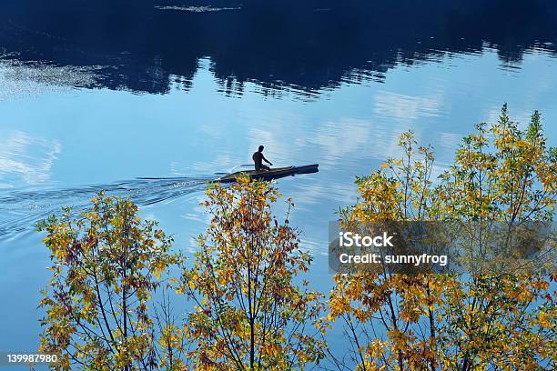 Canoe In The Lake Stock Photo - Download Image Now - Adult, Aquatic Mammal, Aquatic Organism