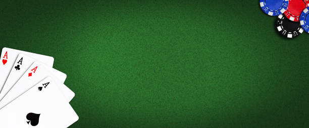 istock Four Aces, and poker chips on a green poker background.Copy Space. Place for text. Vignette. Gamble banner. Playing cards. 1399880329