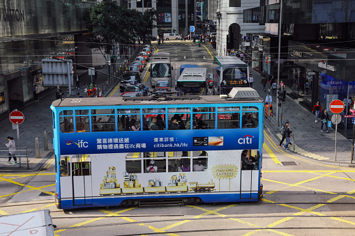 Hong Kong, Hong Kong - 12 05 2017: Hong Kong city tramway busy street traffic business district.