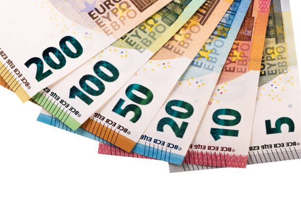 istock Euro banknotes of various denominations on a white background 1399885080