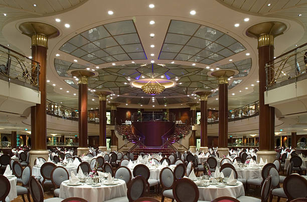 Luxury dining hall with many tables ready for guests to dine