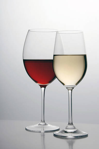 istock White and red wine in separate glasses 139988696