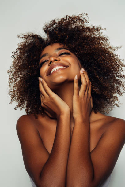 istock Beautiful afro girl with curly hairstyle 1399888085